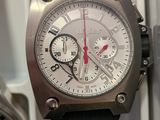a watch that is sitting in a box next to a watch