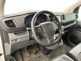 the interior of a car with a steering wheel and dashboard controls