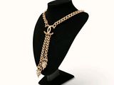 chandelier with chain and pearls on a mannequin base