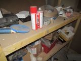 a shelf with various items on it in a room