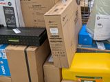 many boxes stacked on top of each other on the floor