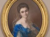 portrait of a woman in a blue dress in a gold frame