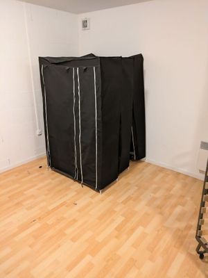 an image of a room that has a black screen in it