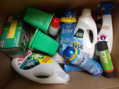 a cardboard box filled with cleaning products and cleaning products