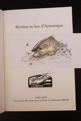 a book with a picture of a fish on it