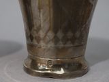 two vases that are sitting on a table