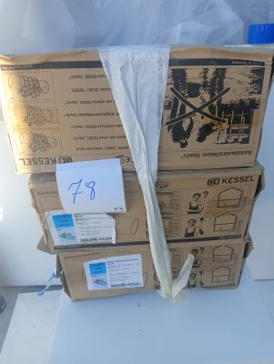 a stack of boxes sitting on top of a white table