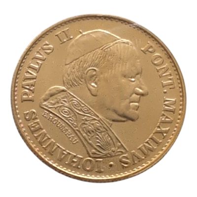 l'image d'une pièce d'or sur laquelle figure le portrait d'un homme