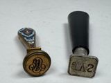 two different types of stamps on a table