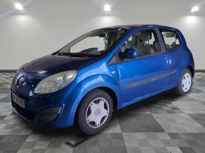 a picture of a small blue car parked in a garage