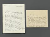 an old handwritten letter and a piece of paper on a table