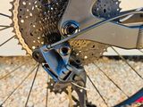 a close up of a bike ' s front wheel and gear