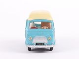 a toy car with a teddy bear inside of it