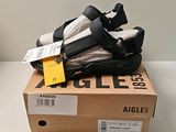 a box with a pair of shoes on top of it