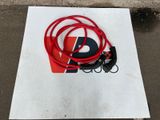 a red and black cable connected to a red and black cord