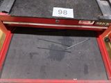 a red tool box with a wrenet in it