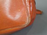 a brown bag that is sitting on a table