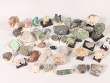 a pile of rocks and stones on a white surface