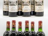 a group of bottles of wine sitting on top of each other