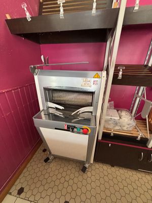 a machine that is sitting in the corner of a room
