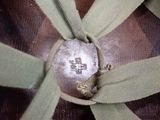 a close up of a piece of cloth with a lizard on it