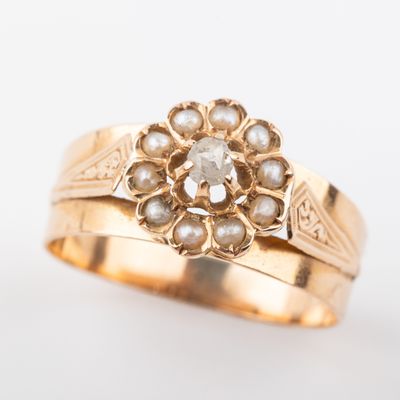 une image d'une bague en or ornée de perles