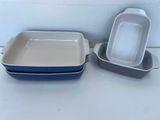 two pans sitting next to each other on a counter