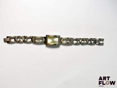 GUESS Montre bracelet de dame en métal argenté