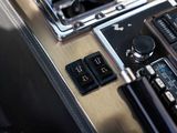 a close up of a control panel in a car