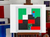 a picture of a painting on a easel in a room