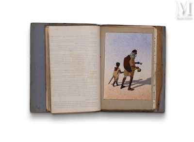 un livre ouvert sur lequel figure l'image d'un homme et d'un enfant