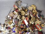a pile of assorted metal items sitting on a table