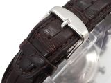 an image of a close up of a watch on a white surface