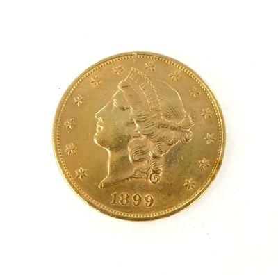 l'image d'une pièce d'or sur laquelle figure une tête de femme