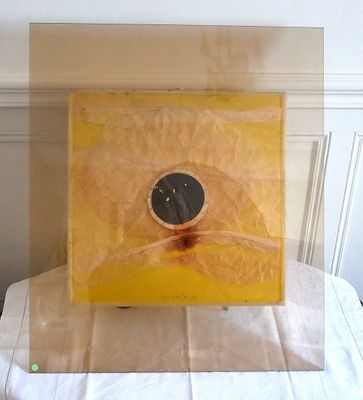 a picture of a picture of a yellow box with a hole in it