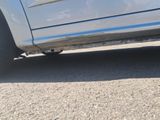 a close up of a car with a flat tire