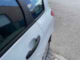 a car that is parked on the side of the street