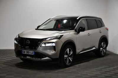 the white nissan suv is parked in a room with a checkered floor