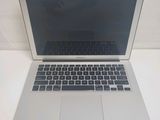 a laptop computer that is sitting on a table