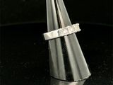 a close up of a ring on a cone on a table