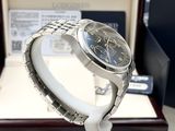 a watch that is sitting on a stand in a box