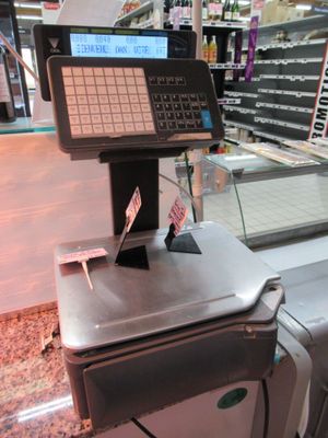 an image of a cash register in a grocery store
