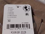 a label on the back of a jacket with a barcode on it