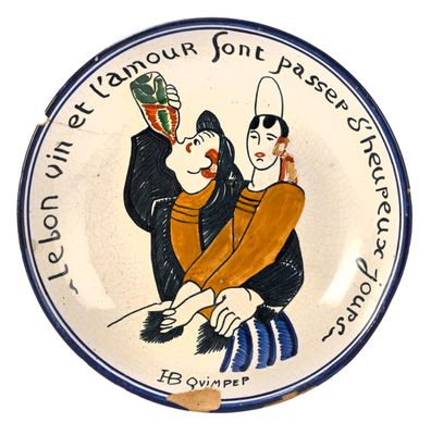 une assiette sur laquelle est représentée une image de deux personnes