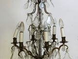 an image of a chandelier hanging from a ceiling in a room