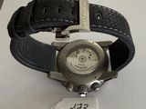 a watch that is sitting on a table with a price tag