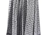 a black and white photo of a skirt with lace on it