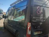 a van that is parked in a parking lot