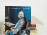 a picture of a book with a picture of a man sitting on a chair