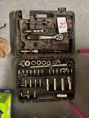 a tool kit that is sitting on the floor